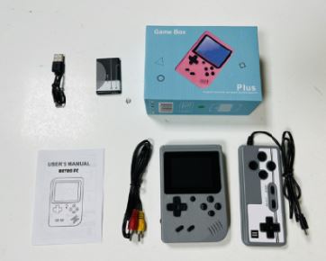 gray game console, controller, cables, manual, box
