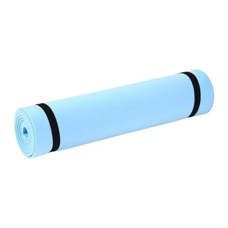 Thick and comfortable blue yoga mat for training and meditation