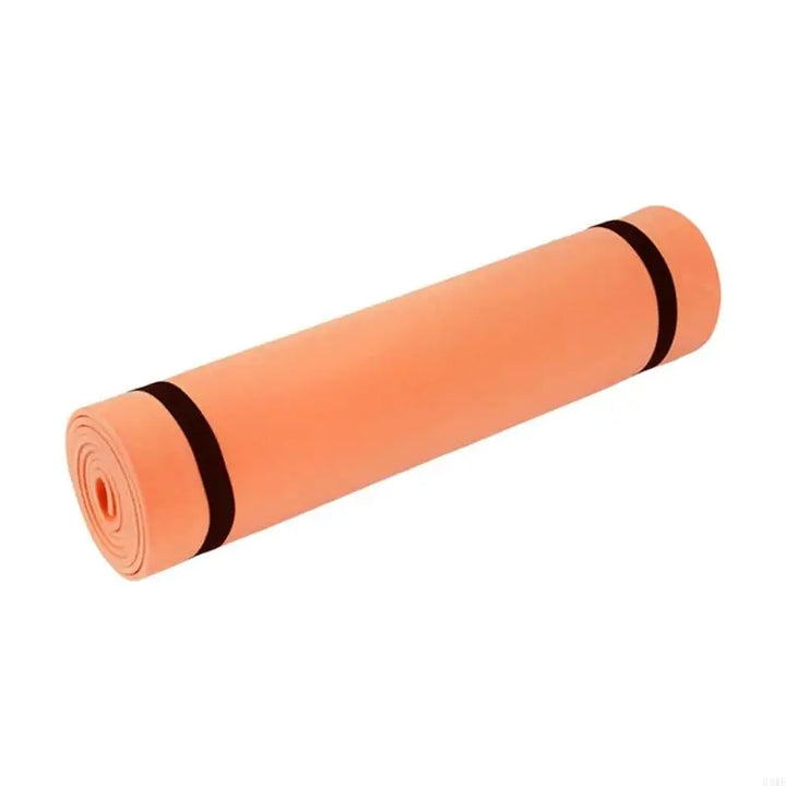 Non-slip orange yoga mat for fitness, pilates, and floor exercises