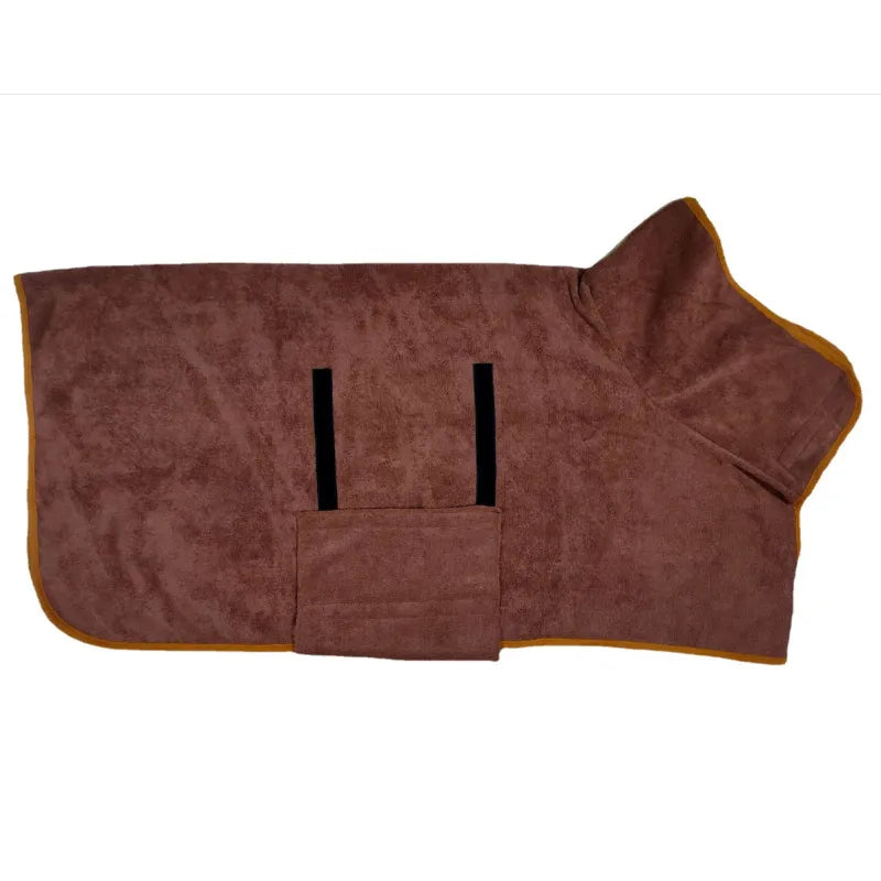 dog wearing purple towel robe