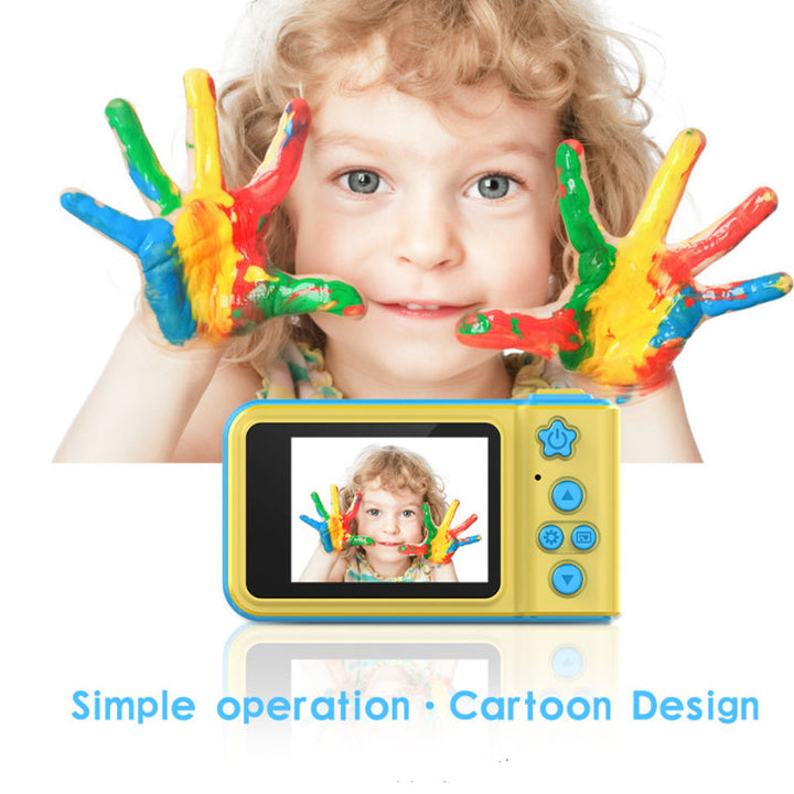 child with painted hands, camera screen
