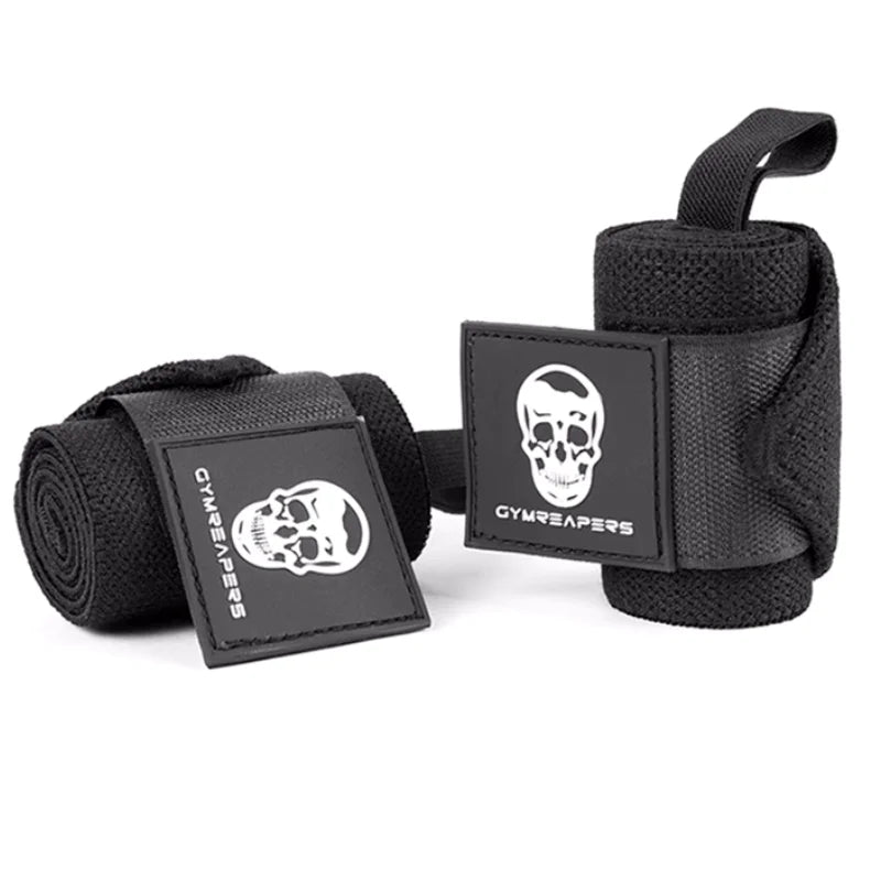 Pair of GymReapers black wrist wraps with skull logo – premium wrist support for powerlifting and CrossFit athletes