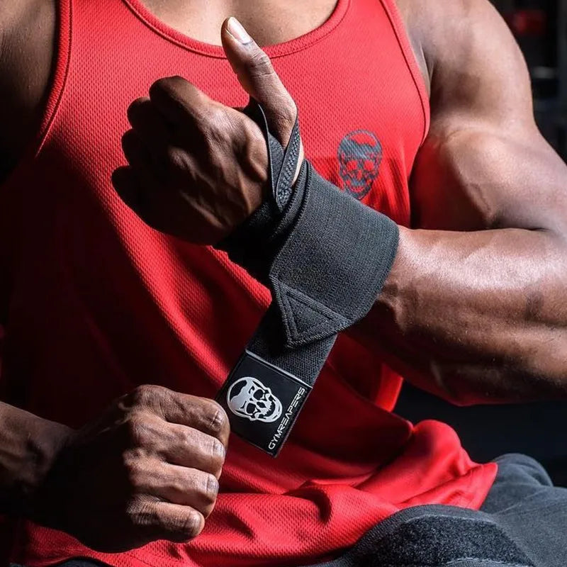 Man doing pull-ups with GymReapers wrist wraps – wrist support with thumb ring for overhead exercises and strength training